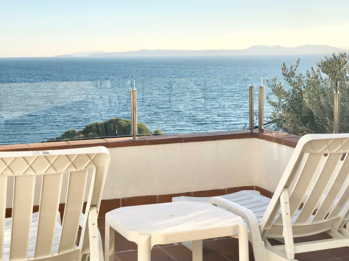 Chalet Doble Almadraba Villa Roses Bagian luar foto